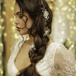 Bride with side plait and hair vine
