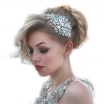 Large crystal headpiece on blond bride