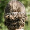 Pearl and crystal wedding hairvine on bride with hair up