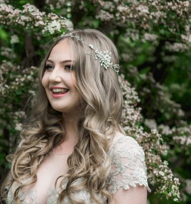 Pearl and crystal bridal hairvine on a long haired bride