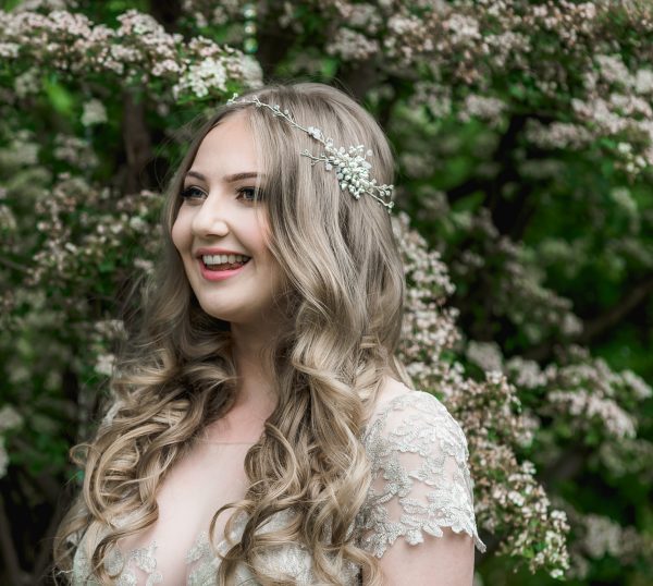 Pearl and crystal bridal hairvine on a long haired bride