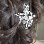 Pearl and crystal bridal comb in brides hair from rocksforfrocks